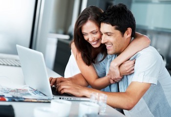 couple_checking_wedding_registry_on_computer-1.jpg