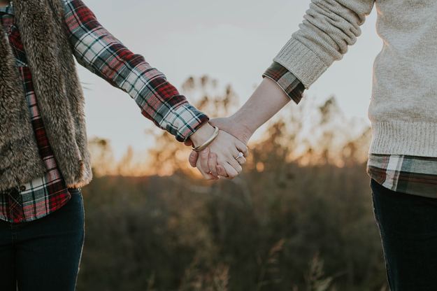 wedding_couple_newlyweds_holding_hands.jpg